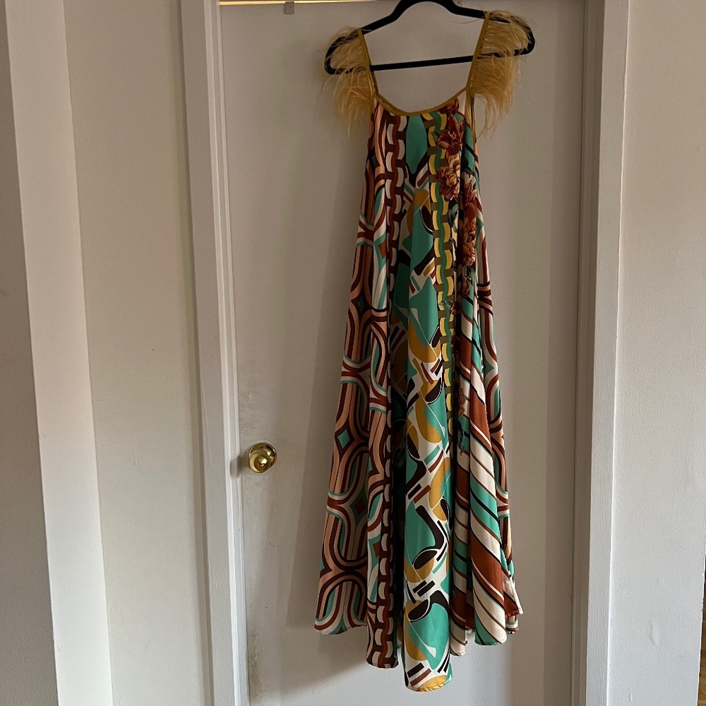 Long dress with feathers